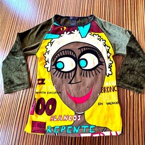 Vintage, designer graphic t-shirt. Felt sleeves. See through, embroidered back.